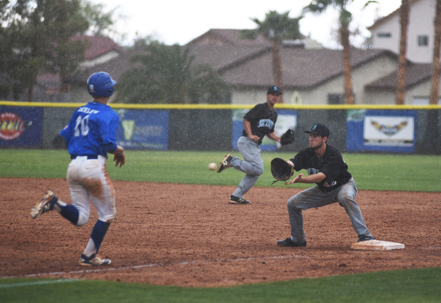 Silverado’s Michael Janosik (42) catches the ball for an out at first base against Gre ...