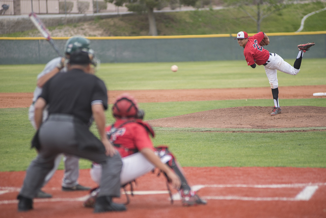 Las Vegas High School’s Jaime Solis (22) pitches against Rancho High School during the ...