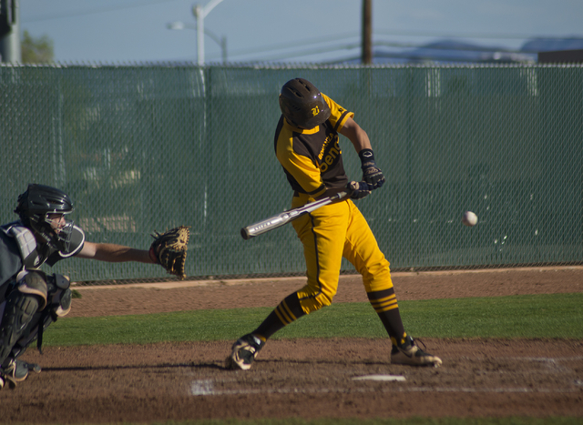 Bonanza’s Micah Higa (8) swings at the ball during their game against Silverado at Bon ...