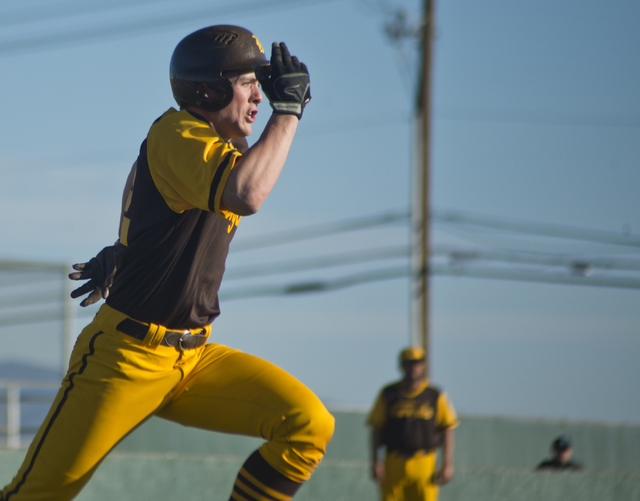 Bonanza’s Chris Dunn (22) makes a run for first base during their game against Silvera ...