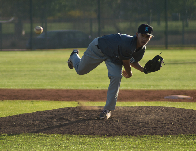 Silverado pitcher Justin DeLeon (5) throws the ball during their game at Bonanza High School ...