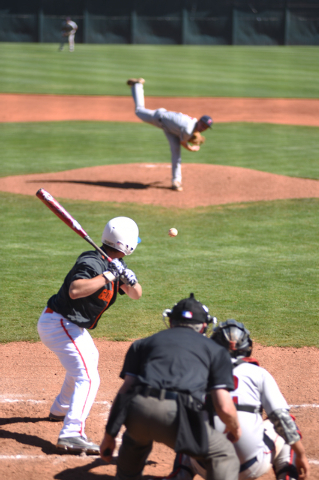 Bishop Gorman’s Beau Capanna (6) looks at a pitch from Liberty’s Trevor Mullany ...