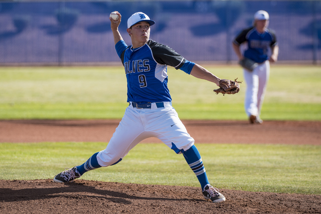 Basic High School pitcher CJ Dornak (9) pitches against Las Vegas High School at Basic High ...