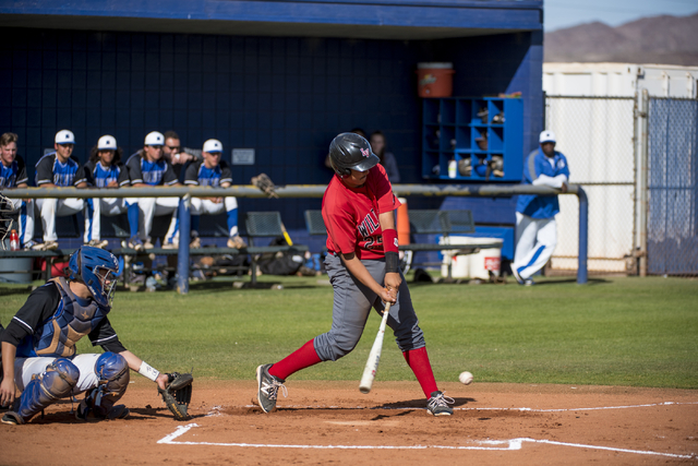 Las Vegas High School’s Antonio Maxilla (25) swings at a pitch during a game against B ...