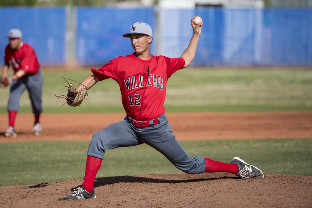 Las Vegas High School’s Austin Strong (12) pitches against Basic at Basic High School ...