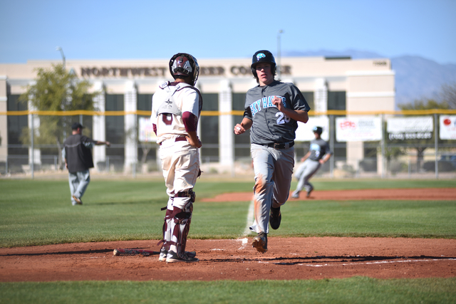 Silverado’s Kevin Pindel (28) scores a run against Cimarron-Memorial during their game ...