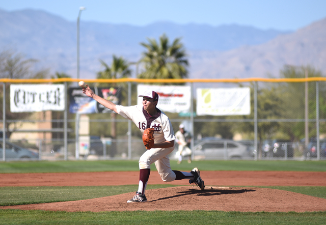 Cimarron-Memorial’s Nick Restifo (16) pitches against Silverado during their game play ...