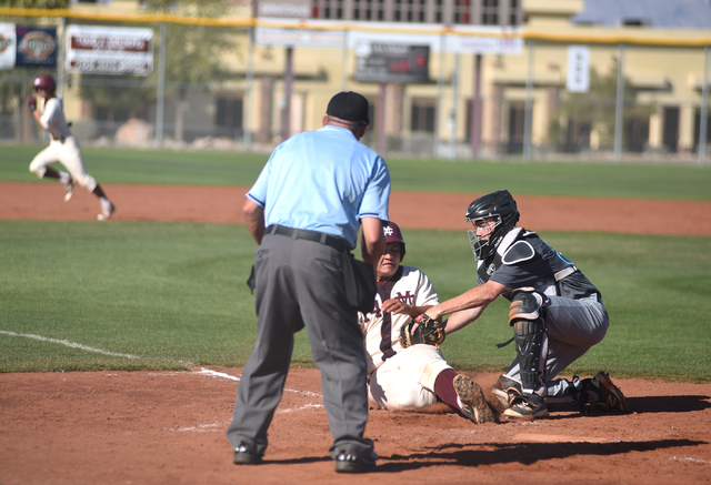 Silverado’s Michael Camburn (20) tags out Cimarron-Memorial’s Justin Cuddeback ( ...