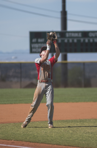 Tech’s Trevor Kephart (2) catches the ball for an out against Boulder City during thei ...