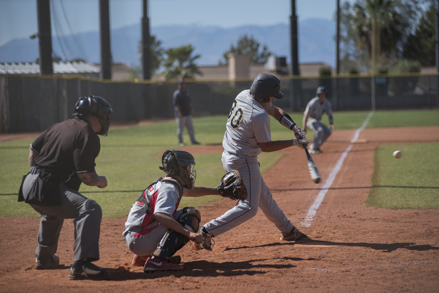 Boulder City’s Preston Van Diest (30) swings at a pitch against Boulder City during th ...