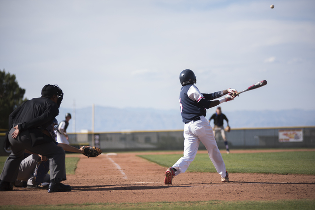 Coronado’s Donte Glover (5) hits the ball against Basic during their baseball game at ...