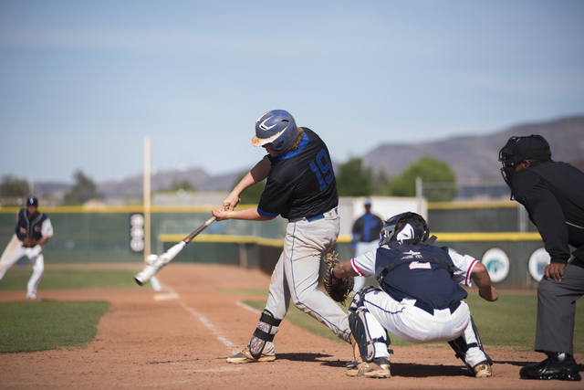 Basic’s Jack Wold (19) hits the ball against Coronado during their baseball game at Co ...