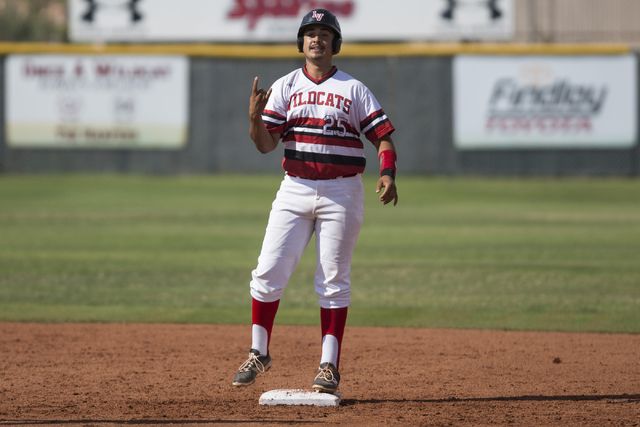 Las Vegas Antonio Gaxiola (25) reacts to hitting a double against Green Valley in their base ...