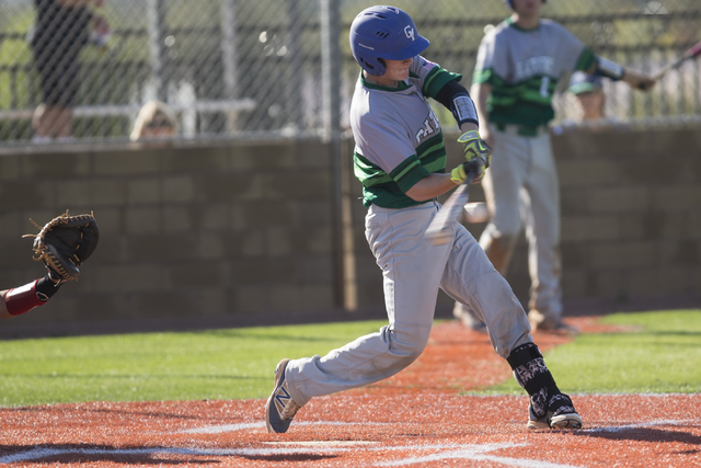 Green Valley’s Jake Leonard (28) hits the ball for a single against Las Vegas in their ...