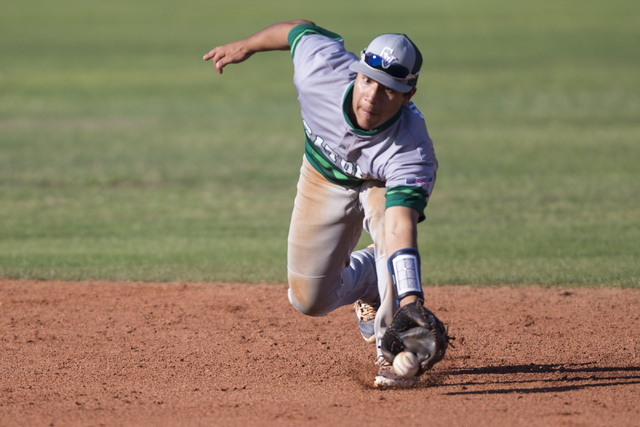 Green Valley’s Jimmy Montiel (6) makes a catch on a bounce which he then threw to firs ...