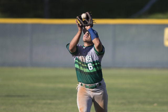 Green Valley’s Jimmy Montiel (6) makes a catch for an out against Las Vegas in their b ...