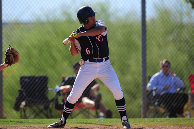 Coronado batter Anthony Carro reacts after being hit by a Liberty pitch in the fourth inning ...