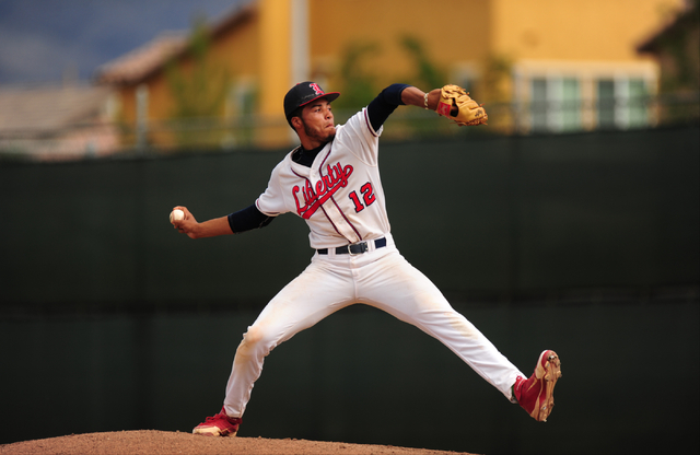 Liberty starting pitcher Ed O’Bannon delivers to Silverado in the second inning of the ...