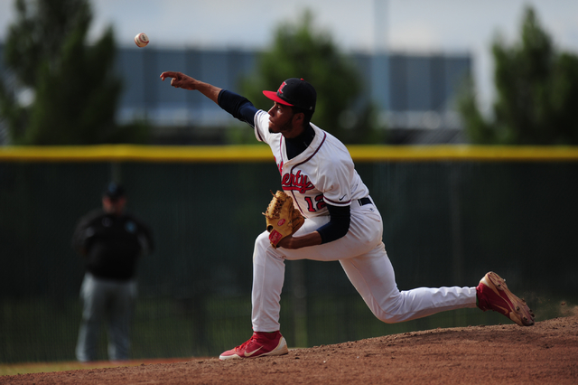 Liberty starting pitcher Ed O’Bannon delivers to Silverado in the third inning of thei ...