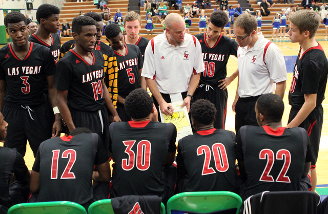 Las Vegas head coach Jason Wilson gives instructions to his players before the start of the ...