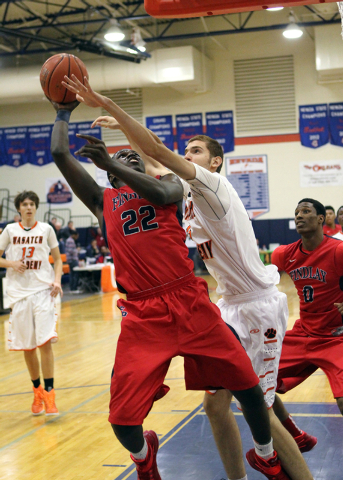 Findlay Prep forward/guard Donnie Tillman (22) shoots over Wasatch Academy center Barzin Bad ...