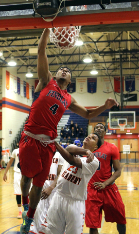 Findlay Prep guard Allonzo Trier (4) dunks in front of Wasatch Academy guard/forward Shamiel ...