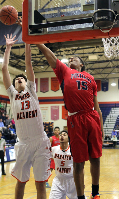 Findlay Prep forward P.J. Washington (15) and Wasatch Academy forward/center Josip Vrankic ( ...