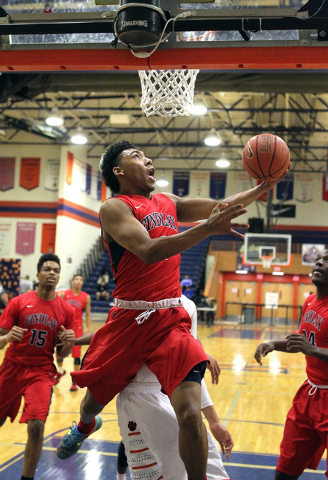 Findlay Prep guard Allonzo Trier (4) goes up for a shot against Wasatch Academy in the first ...