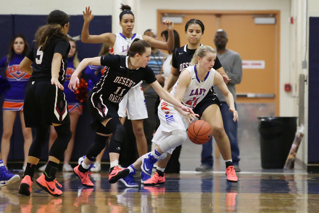 Desert Oasis senior Ashlynn Sharp steals the ball from Bishop Gorman senior Samantha Coleman ...