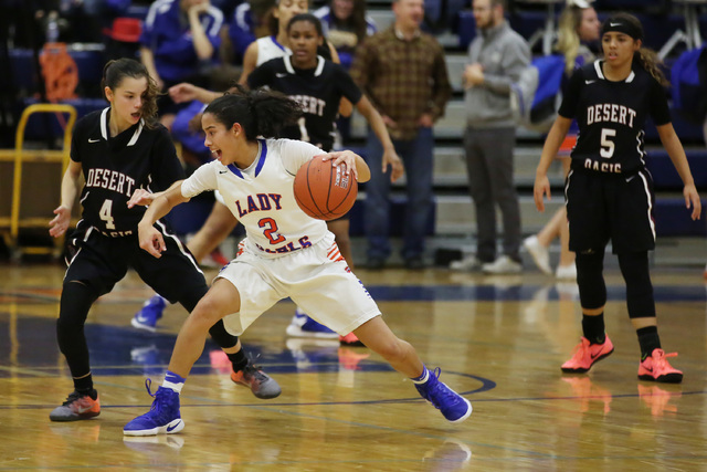 Desert Oasis sophomore Brianna Clark, left, attempts to guard Bishop Gorman sophomore Shaira ...