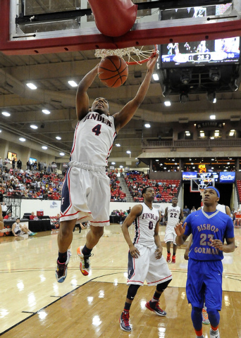 Findlay Prep guard Allonzo Trier (4) dunks against Bishop Gorman during Saturday’s gam ...