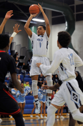 Canyon Springs’ Jordan Davis (1) shoots against Las Vegas High on Monday. Davis had 20 ...