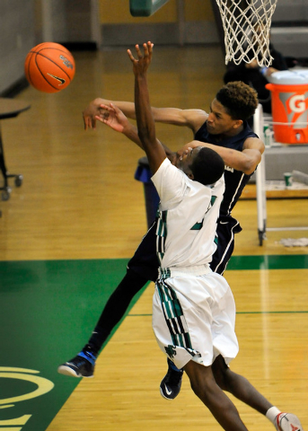 Rancho’s Siriman Keita, front, draws an intentional foul from Agassi Prep’s Kobe ...