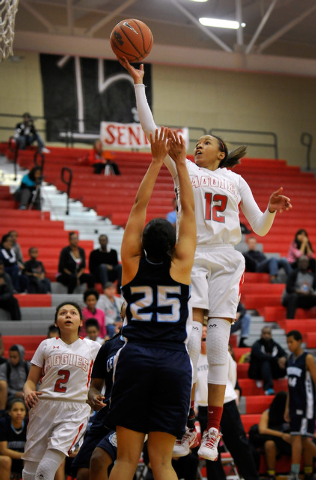 Arbor View’s Ariona Gill shoots against Centennial’s Karina Brandon on Monday. G ...