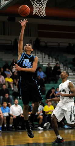 Foothill’s Marvin Coleman (23) shoots as Palo Verde’s Ja Morgan looks on during ...