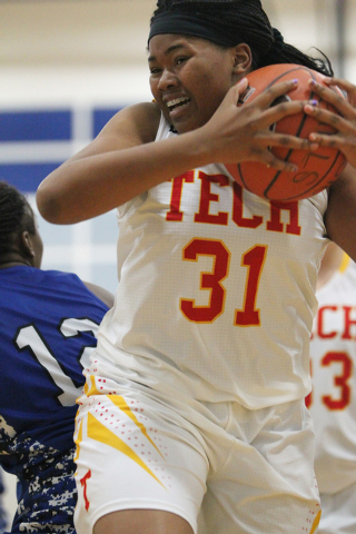 Tech’s Patrice Thomas (31) grabs the ball against Desert Pines in the Lady Wolves Holi ...