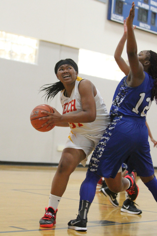 Tech’s Patrice Thomas (31) looks for an open shot against Desert Pines See’Airra ...