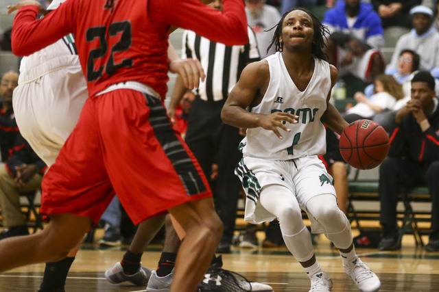 Rancho guard Jahleel Stevens (1) drives to the basket against Las Vegas during a basketball ...