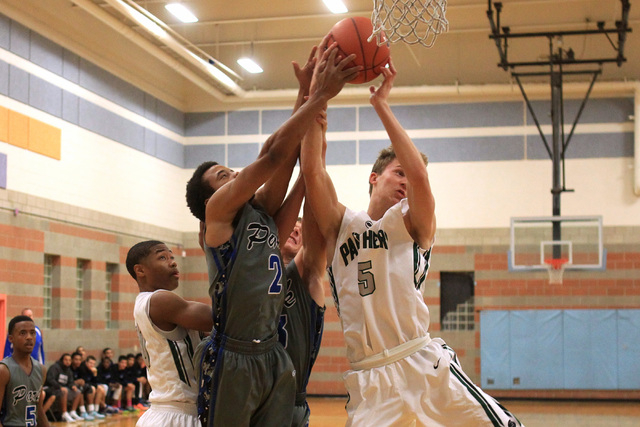 Palo Verde forward Grant Dressier grabs a rebound from Basic guard Jaimen Williams on Thursd ...