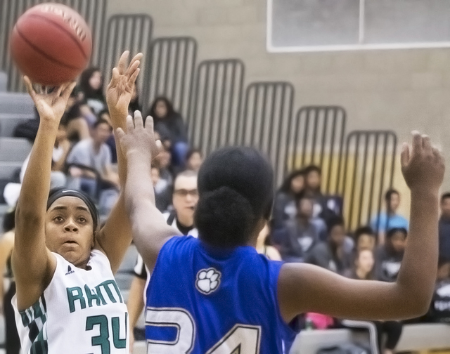 Rancho’s Courtney Plumer (34) shoots over Sierra Vista’s Shania Harper (34) duri ...