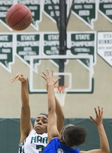 Rancho’s Courtney Plumer (34) shoots over Sierra Vista’s Kayla Barnum (5) during ...