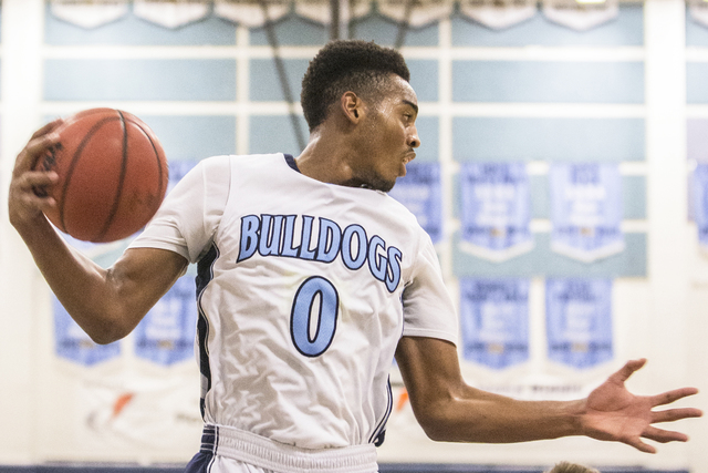 Centennial’s Troy Brown (0) grabs a rebound over Faith Lutheran’s Connor Nichols ...