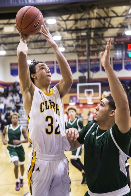 Clark’s Ian Alexander (32) drives past Chino Hills’ LiAngelo Ball (3) during the ...