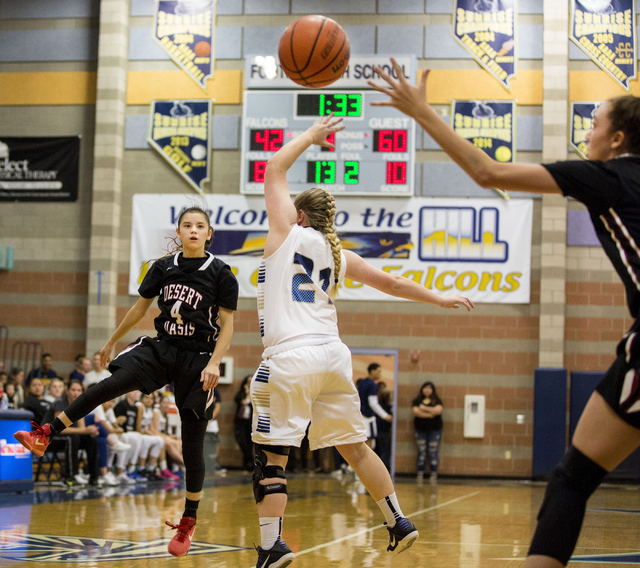 Desert Oasis’ Brianna Clark, (4), passes the ball to a teammate during a game against ...