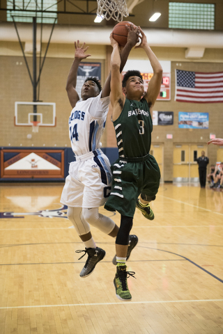 Centennial’s Kamakana Winquist (44) left, and Keenan Adams-Barausse (3) of Robert Bate ...