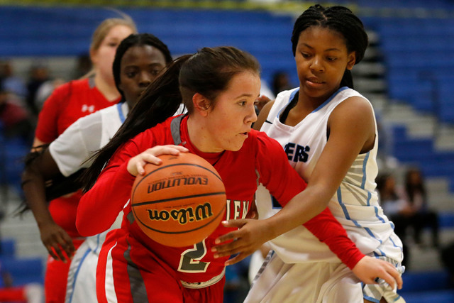 Arbor View’s Kalli Hosier, left, keeps a ball away from Canyon Springs’ LeAsiani ...