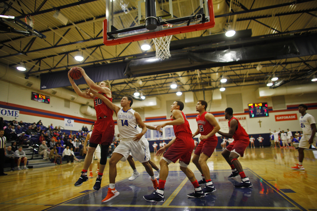 Corando forward Kennedy Koehler (30) goes to up to score against Bishop Gorman’s forwa ...