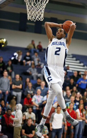 Centennial’s Troy Brown goes up for a dunk on Friday against Durango. Brown had 16 points ...