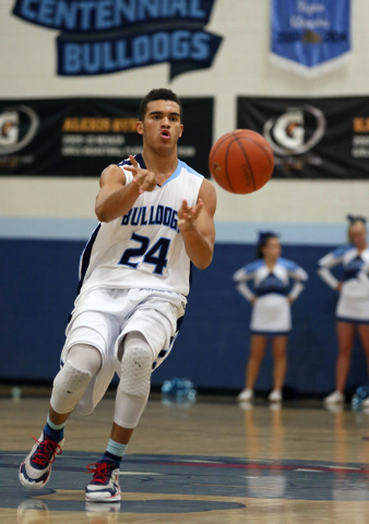 Centennial’s Darrian Traylor passes the ball during a basketball game against Durango on F ...