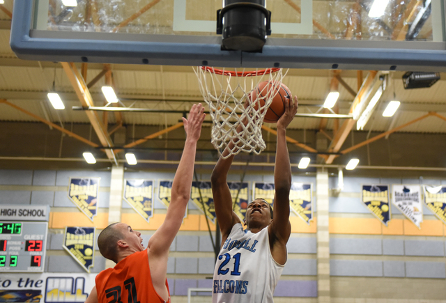 Foothill’s Torrance Littles (21) goes up for a shot against National Prep Academy&#821 ...